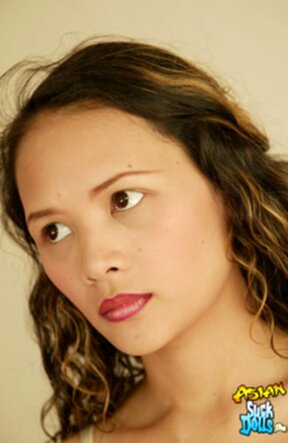 Nuch strips in bedroom and spreads her legs on bed